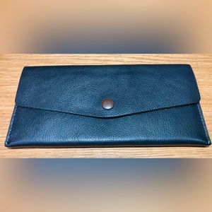 Black wallet. Good used condition. Wallet for sale, contents not included.